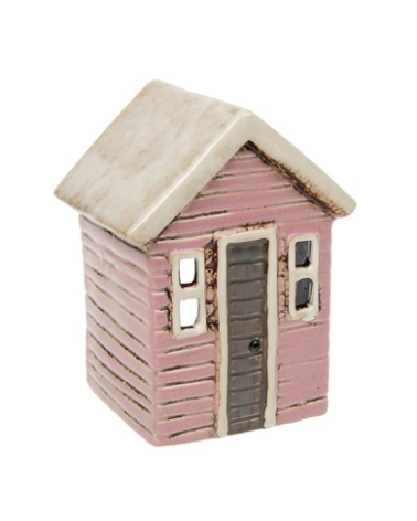 maison de plage rose toit blanc